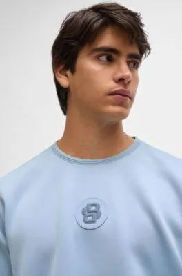 Camiseta relaxed fit con insignia de monograma doble