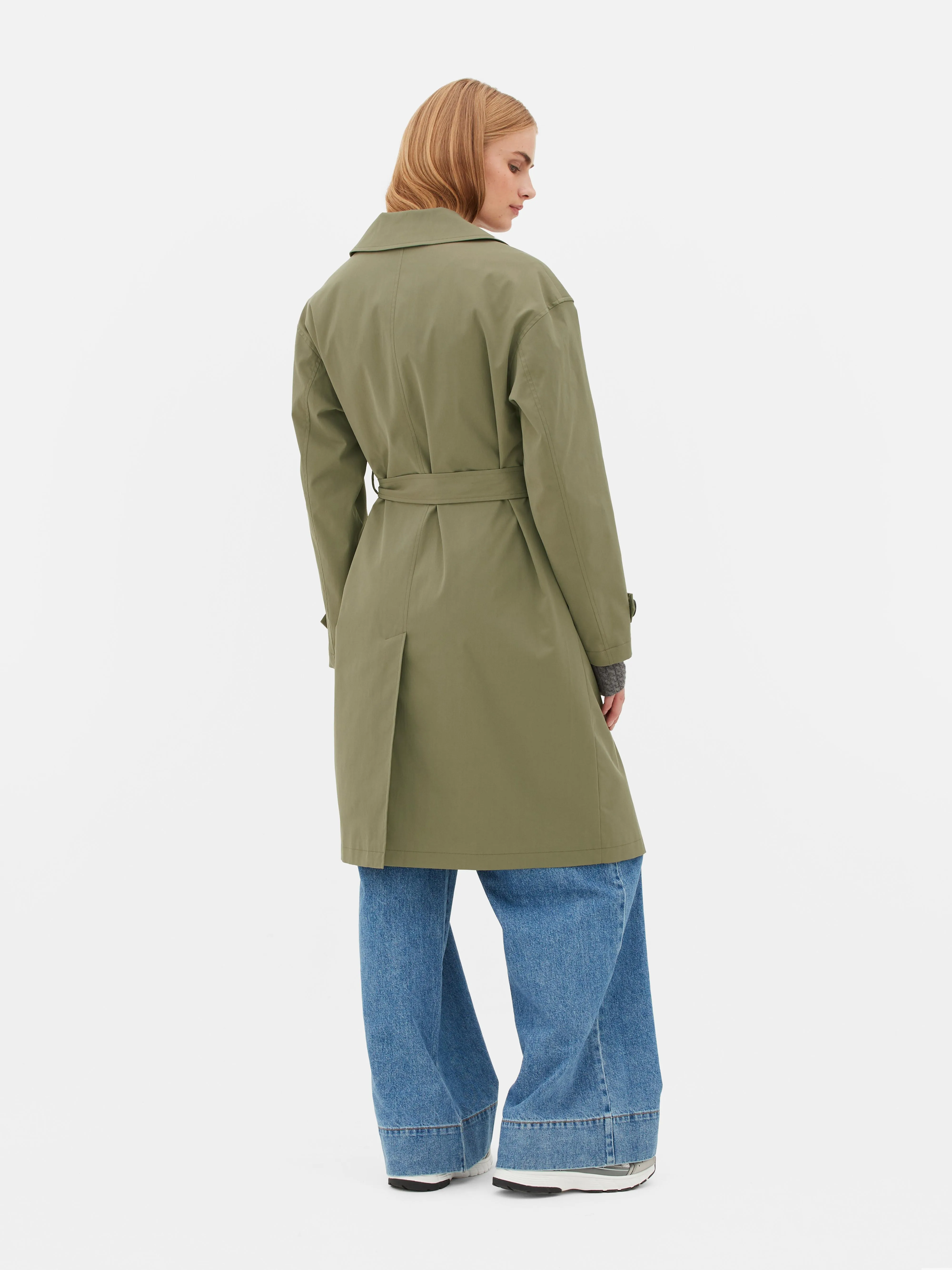 Gabardina de doble botonadura con cinturón