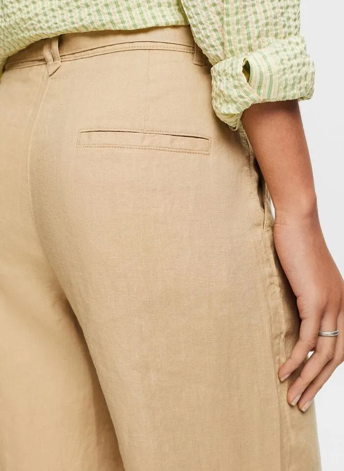 Pantalón ancho de lino en beige